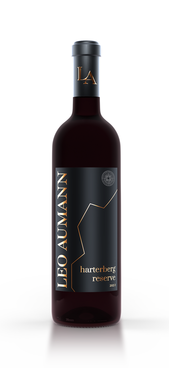 A bottle of Leo Aumann Harterberg Reserve 2021 red wine with a black and gold label.