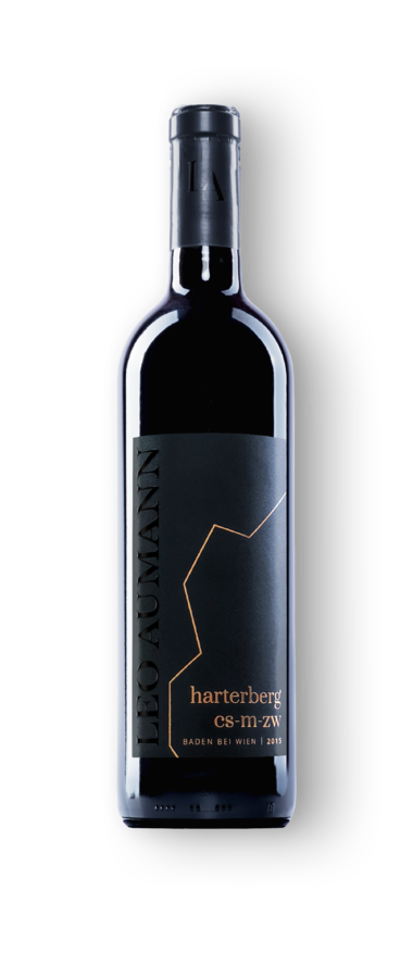 A bottle of Leo Aumann Harterberg red wine with a black and gold label on a white background.