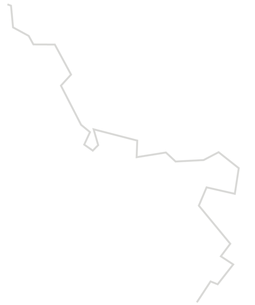 A jagged, irregular gray line on a transparent background that resembles a rough path or zigzag.